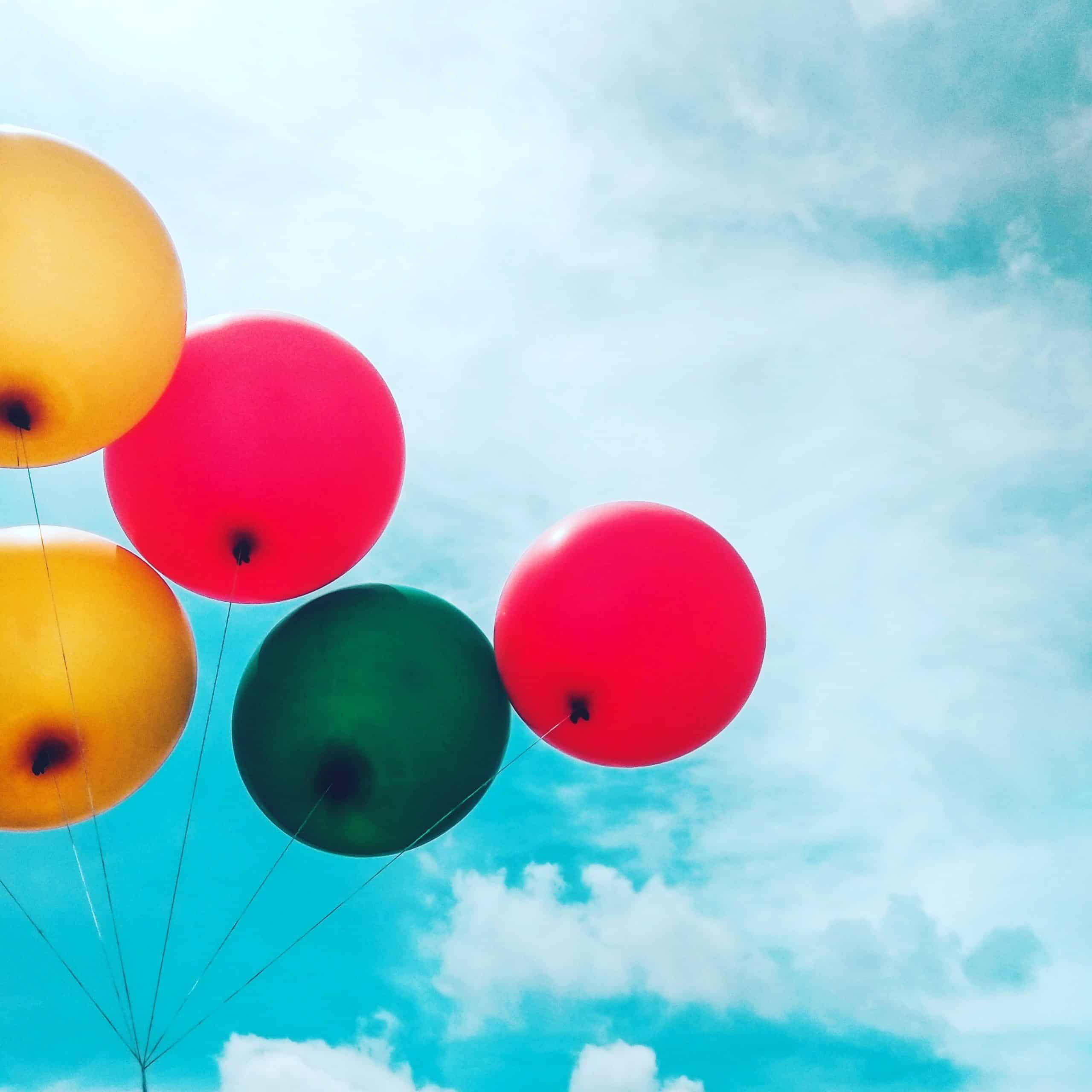 Balloons under blue sky